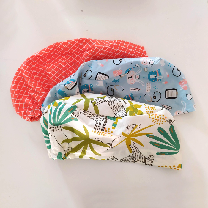 gorros-goma Gorro para sanitarios, con goma o cintas.